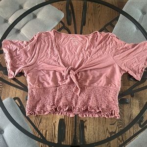 Pink Hollister top with tie in the front.